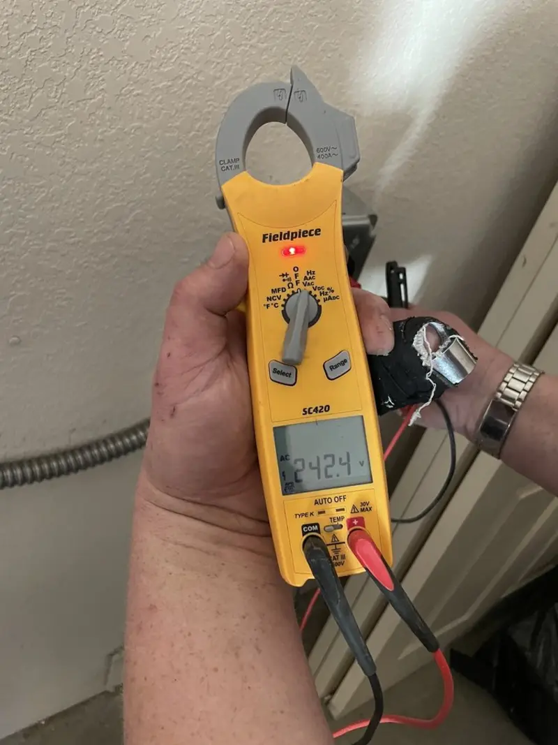 Voltage testing with clamp meter during Electrical Installation Services in Pine Grove